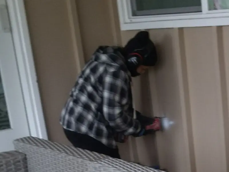Professional electrician installing an exterior outlet in Baraboo